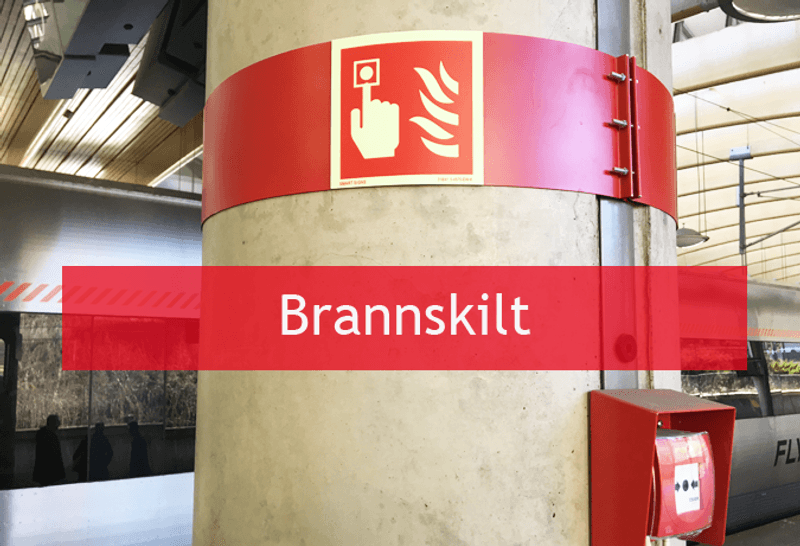Rømningsveiskilt